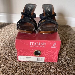 Italian shoemakers wedge wood black sandals. Worn a couple of times.